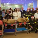 I bambini dell'Ospedale sorridono alla vista dei Pompieri