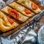 La pinsa romana fragrante e leggera